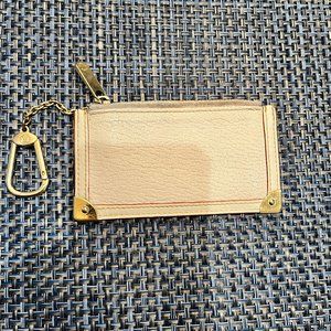 Authentic Louis Vuitton White Suhali Poche Cles